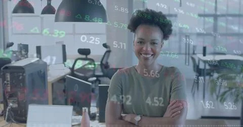 Image of financial data processing over african american businesswoman in office 스톡 사진