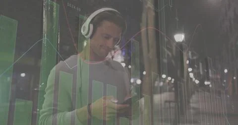 Image of financial data processing over biracial man with smartphone on the go Foto stock