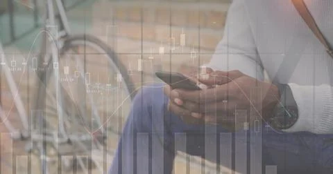 Image of financial data processing over african american man with smartphone on Stock Photos