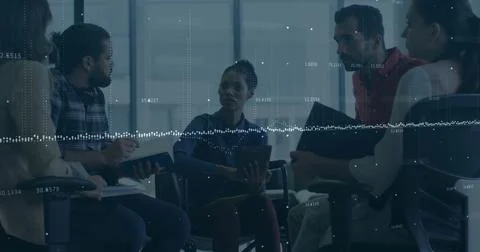 Image of financial data processing over diverse colleagues having meeting in Stock Photos