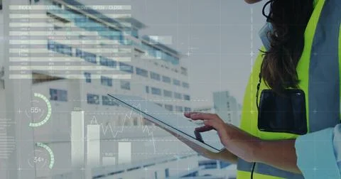 Image of financial data processing over biracial female architect using tablet Stock Photos