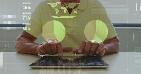 Image of financial data processing over caucasian businessman using tablet Stockfoto's