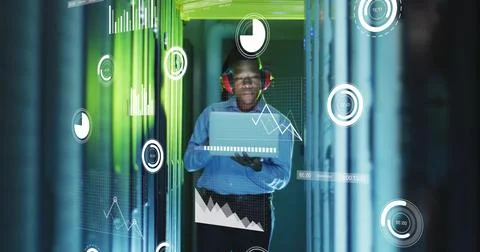 Image of financial data processing over african american businessman in server Foto stock