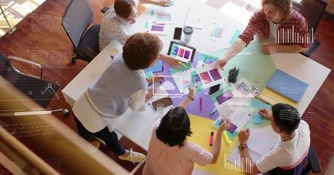Image of financial data processing over diverse business people in office 스톡 사진