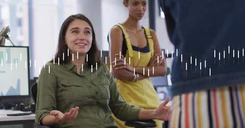 Image of financial data processing over diverse businesspeople in office 写真素材