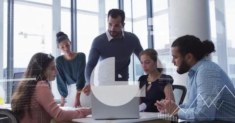 Image of financial data processing over diverse business people in office 写真素材