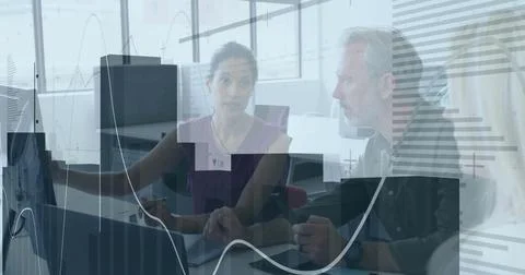 Image of financial data processing over diverse business people in office Foto stock