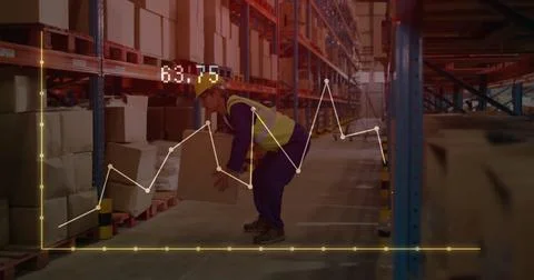 Image of financial data processing over asian male worker in warehouse Foto stock