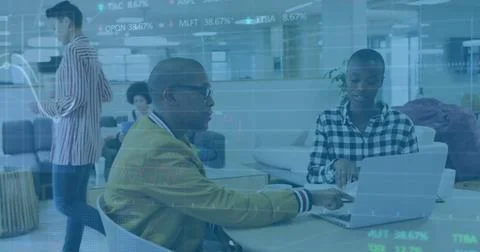 Image of financial data processing over diverse colleagues discussing work in Stock Photos