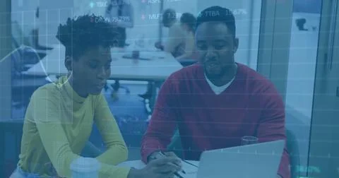 Image of financial data processing over diverse colleagues discussing work in Stock Photos