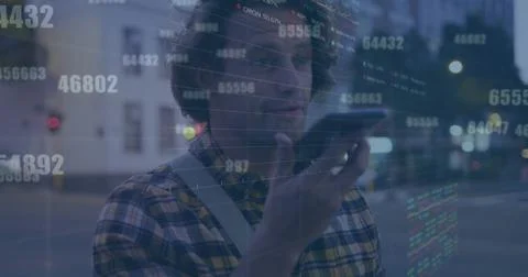Image of financial data processing over caucasian man using smartphone in city Foto stock
