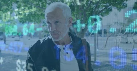 Image of financial data processing over caucasian man in city Foto stock