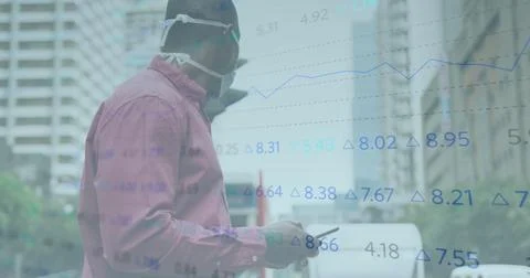 Image of financial data processing over african american man in face mask using Foto stock