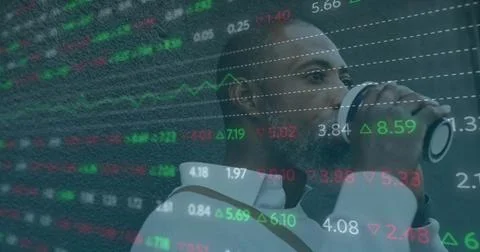 Image of financial data processing over african american man using smartphone in Foto stock