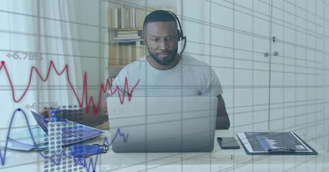 Image of financial data processing over african american man using laptop 스톡 사진