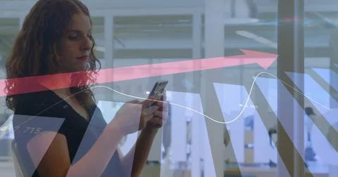 Image of financial data processing over caucasian woman using smartphone 写真素材