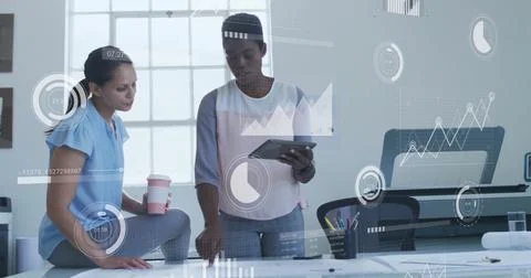 Image of financial data processing over diverse colleagues discussing work in Stock Photos