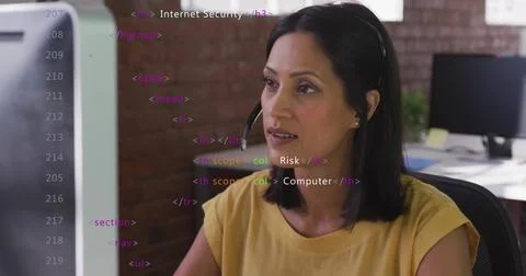 Image of financial data processing over biracial businesswoman using computer in Stock Photos