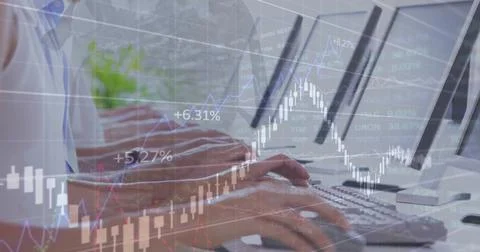 Image of financial data processing over diverse business people using computers Foto stock