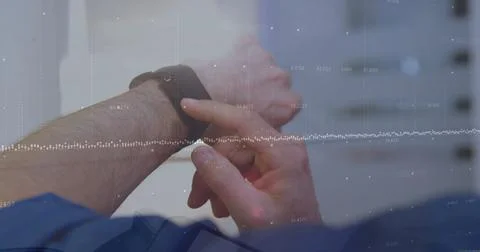 Image of financial data processing over caucasian man using smartwatch 스톡 사진