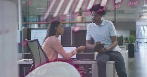 Image of financial data processing over diverse business people in office Stockfoto's