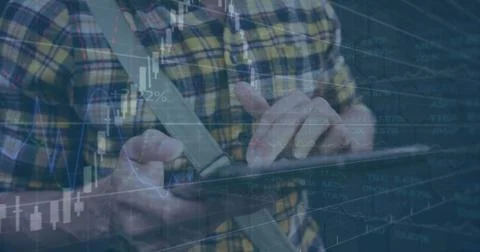 Image of financial data processing over caucasian man using tablet Foto stock