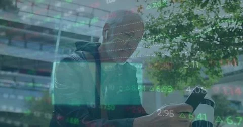 Image of financial data processing over caucasian man using smartphone 스톡 사진