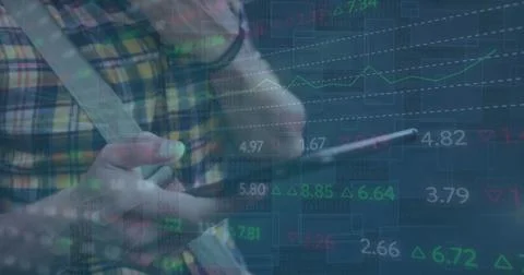 Image of financial data processing over caucasian man using tablet Stock Photos