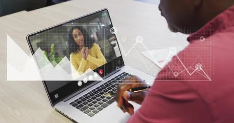 Image of financial data processing over african american man on laptop video Stock Photos