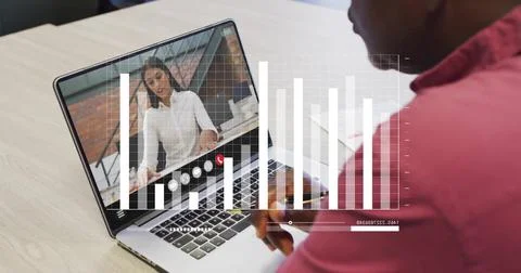 Image of financial data processing over african american man on laptop video Stock Photos