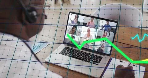 Image of financial data processing over african american man on laptop video 写真素材