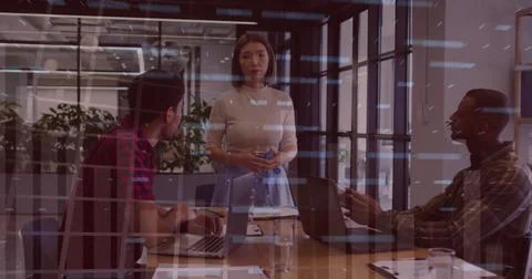 Image of financial data processing over diverse colleagues having meeting in Stock Photos