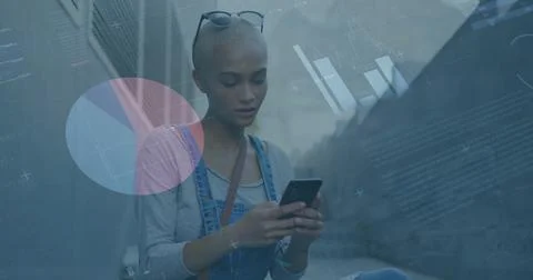Image of financial data processing over biracial woman using smartphone on the Stock Photos