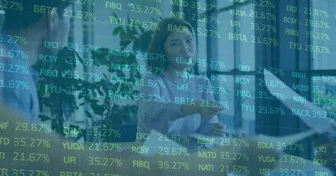 Image of financial data processing over diverse business people in office Stockfoto's