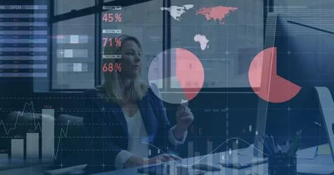 Image of financial data processing over caucasian businesswoman using computer Stockfoto's