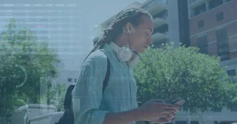 Image of financial data processing over biracial man using smartphone Foto stock