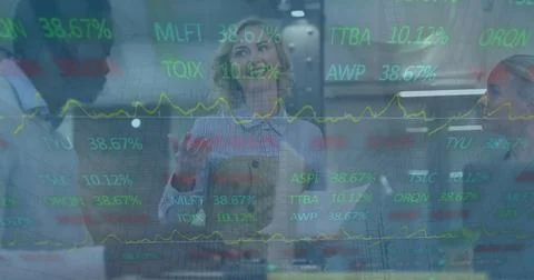 Image of financial data processing over diverse business people in office 写真素材