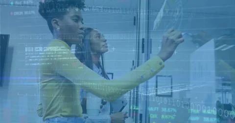 Image of financial data processing over diverse colleagues brainstorming in 写真素材