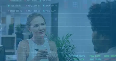 Image of financial data processing over diverse colleagues discussing work in 스톡 사진