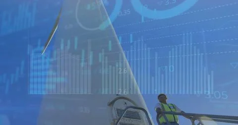 Image of financial data processing over male engineer by wind turbine Stock Photos