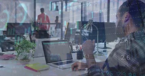 Image of financial data processing over caucasian businessman using computer in Stock Photos