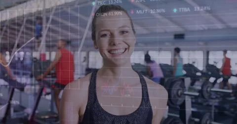 Image of financial data processing over caucasian woman in gym Foto stock