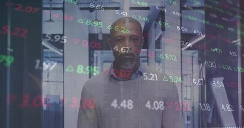 Image of financial data processing over african american businessman in office 스톡 사진