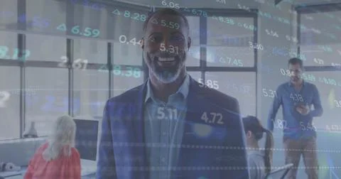 Image of financial data processing over african american businessman in office 스톡 사진
