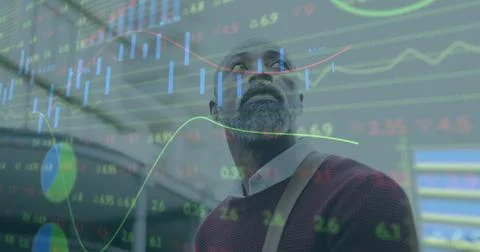 Image of financial data processing over african american man walking in city Stock Photos
