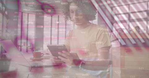 Image of financial data processing over biracial man using tablet Foto stock