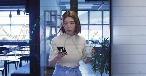 Image of financial data processing over biracial businesswoman using smartphone Foto stock