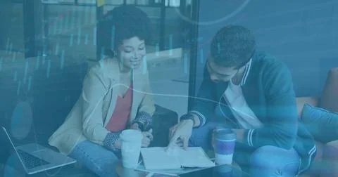 Image of financial data processing over diverse business people in office Stockfoto's