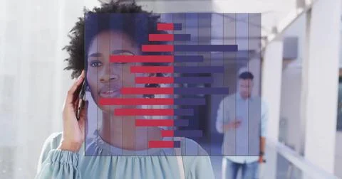 Image of financial data processing over diverse business people in office Foto stock