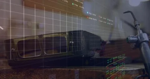 Image of financial data processing over goggles and tools in workshop Stock Photos